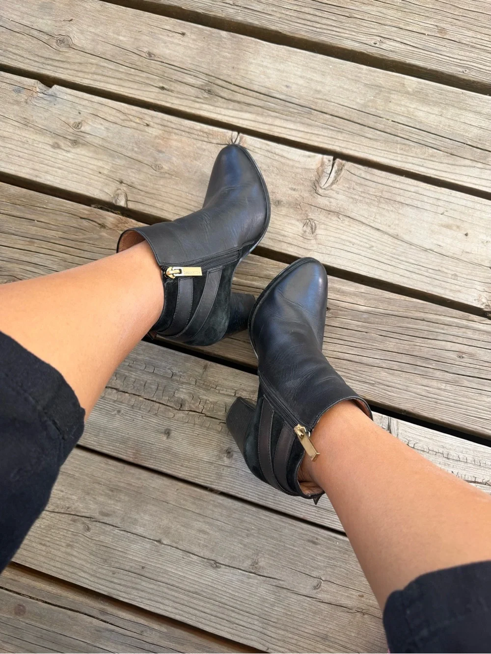 Louise et Cie Black Leather Ankle Booties with Gold Zipper Accent